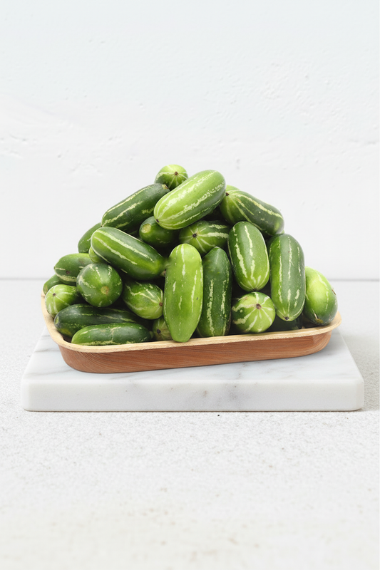 Ivy gourds with marble pedestal background