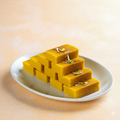 Golden barfi in square format