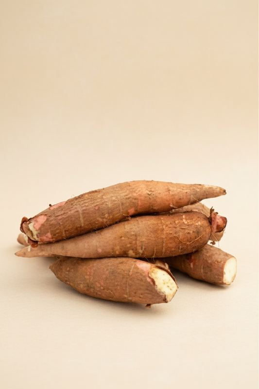 Sweet potato with different beige background